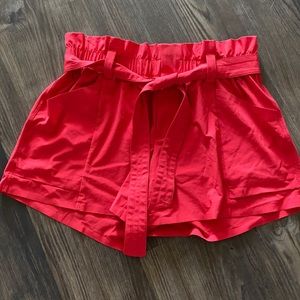 Athleta skyline coral red shorts with tie belt